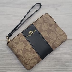 Coach Corner Zip Wristlet In Signature Canvas